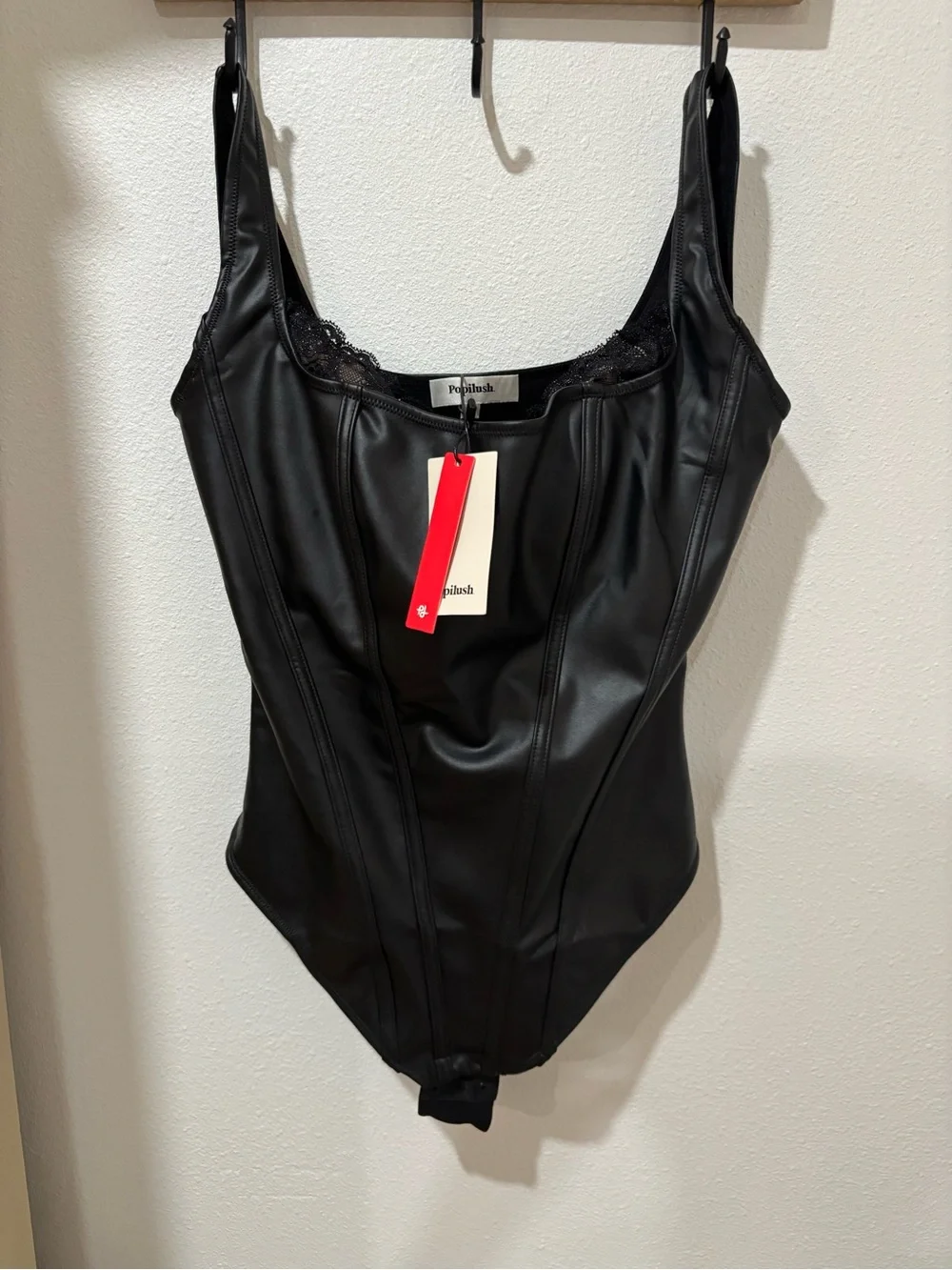Lush Black Faux-Leather Kids One-Piece Bodysuit with Lace Trim